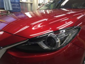アクセラ・プレミアムコーティング後の左ヘッドライト付近