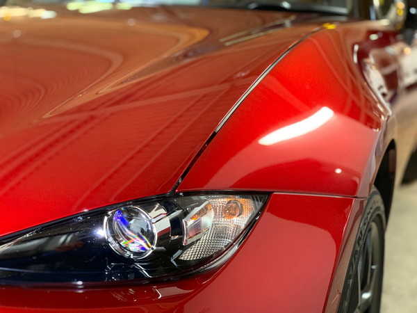 NDロードスター・プレミアムコーティング施工後の左ヘッドライト付近